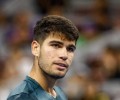 Алькарас вышел в четвертый круг Australian Open после снятия Шан Цзюньчэна